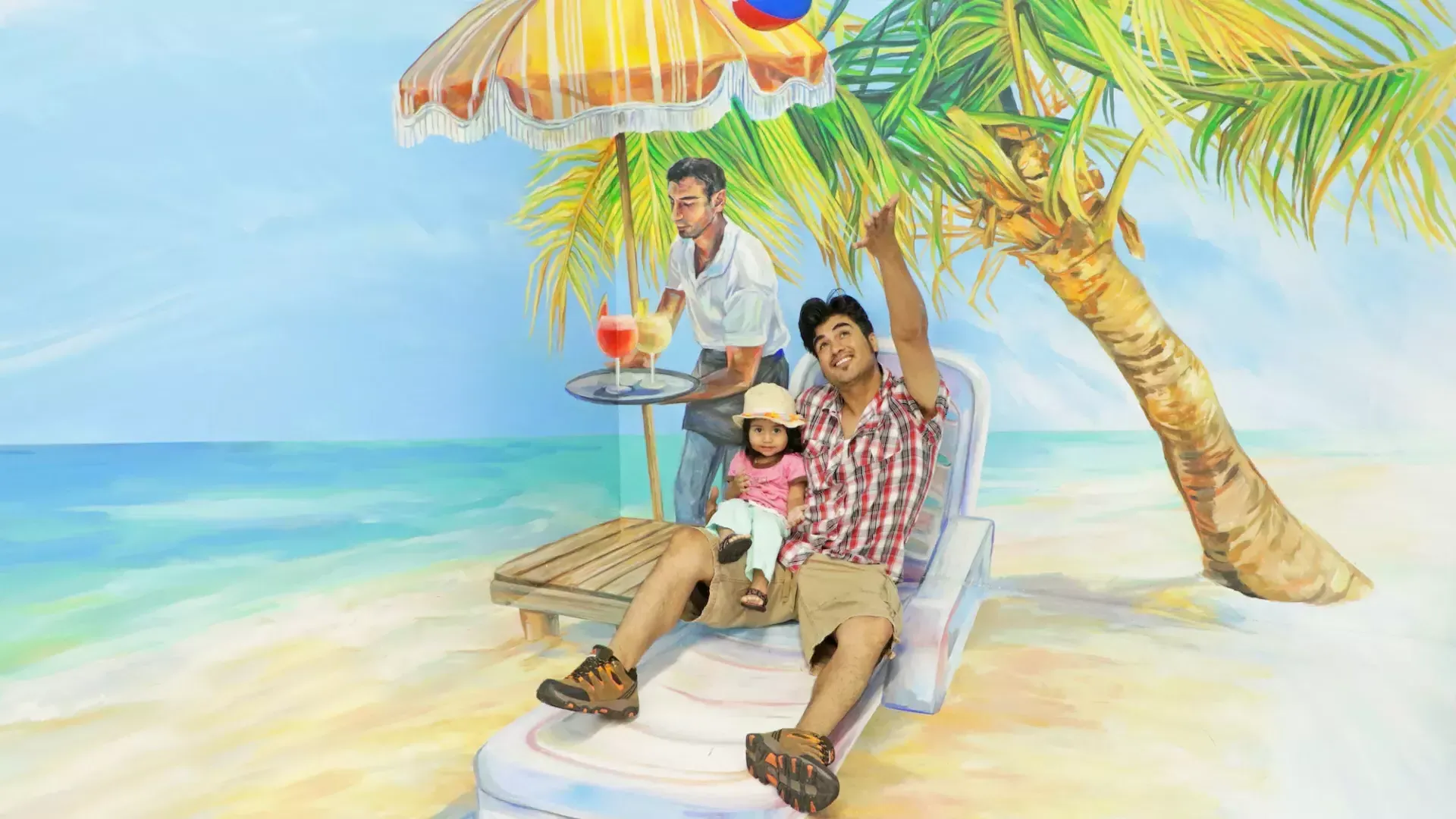 A father and baby visit the Museum of 3D Illusions